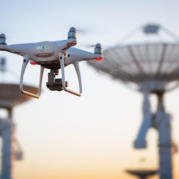 Drone flying at the Satellite antenna array